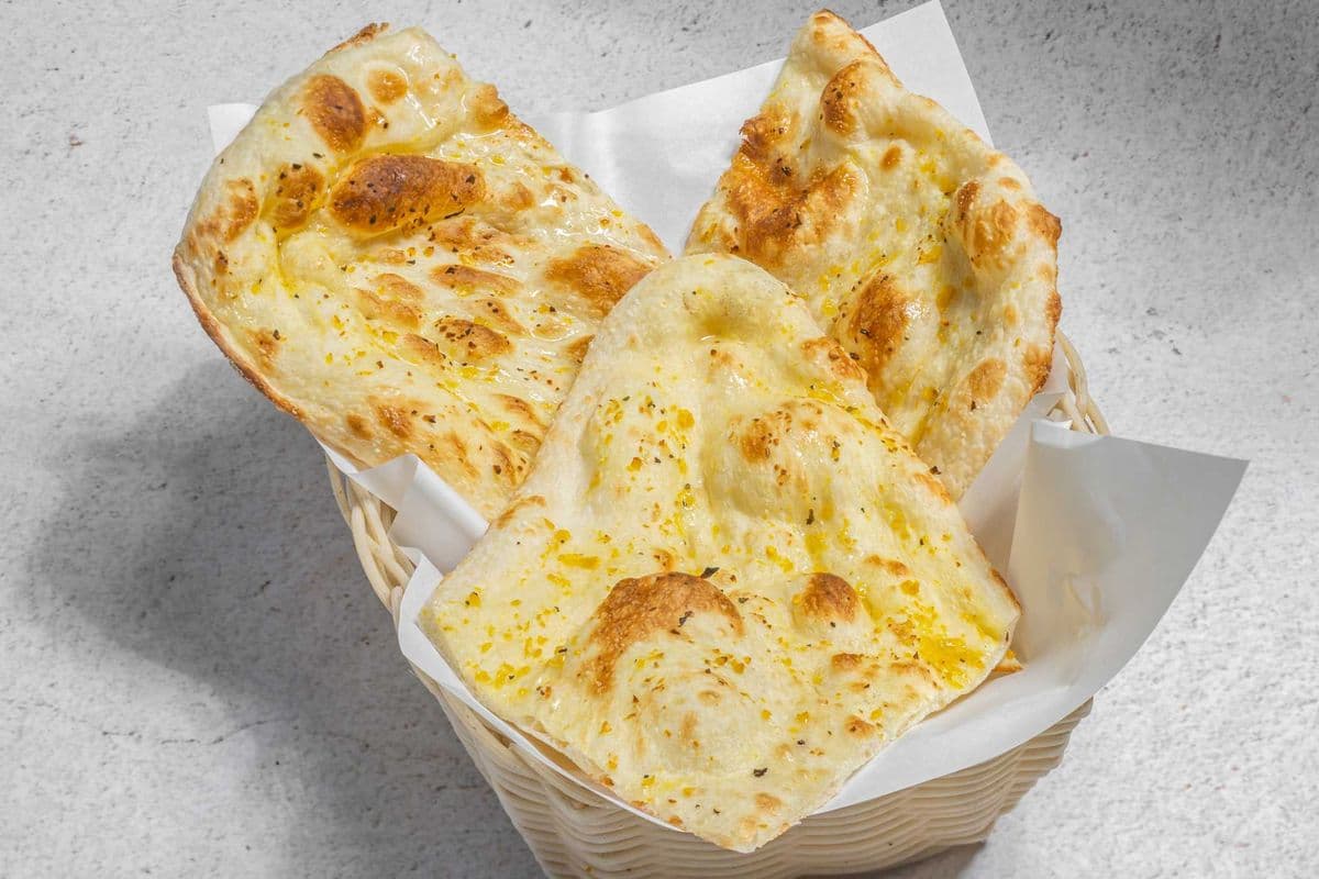100. Naan Tandoori Flame