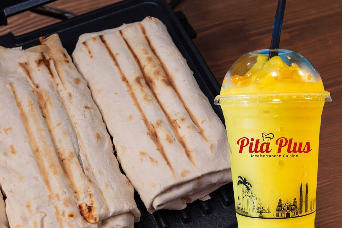 Butter Paneer Shawarma Wrap (R) + Mango Bliss Shake