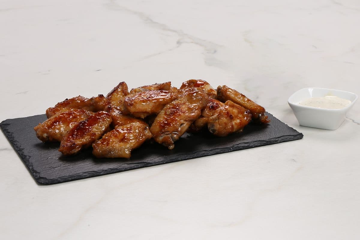 12 Buffalo Style Chicken Wings with 1 Dipping Sauce On Side