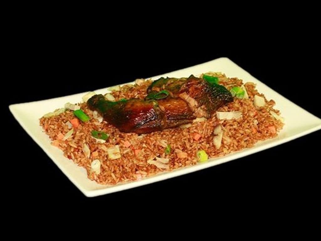 Vegetable Fried Rice with Jerk Chicken on Top