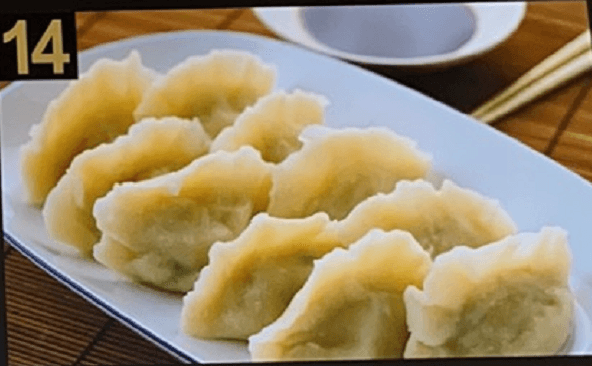 14. Steamed Pork Dumplings 北方水饺 (10 pcs)