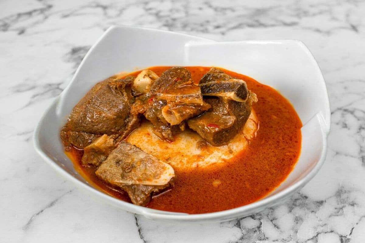 Fufu And Light Soup With Goat