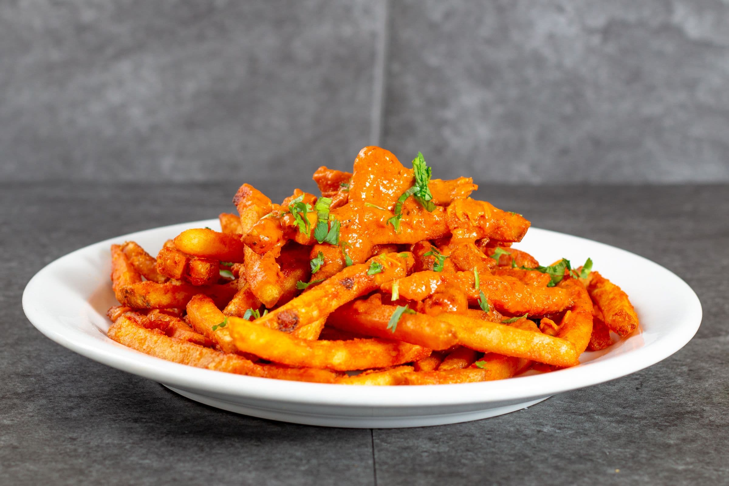 Butter Chicken Masala Poutine