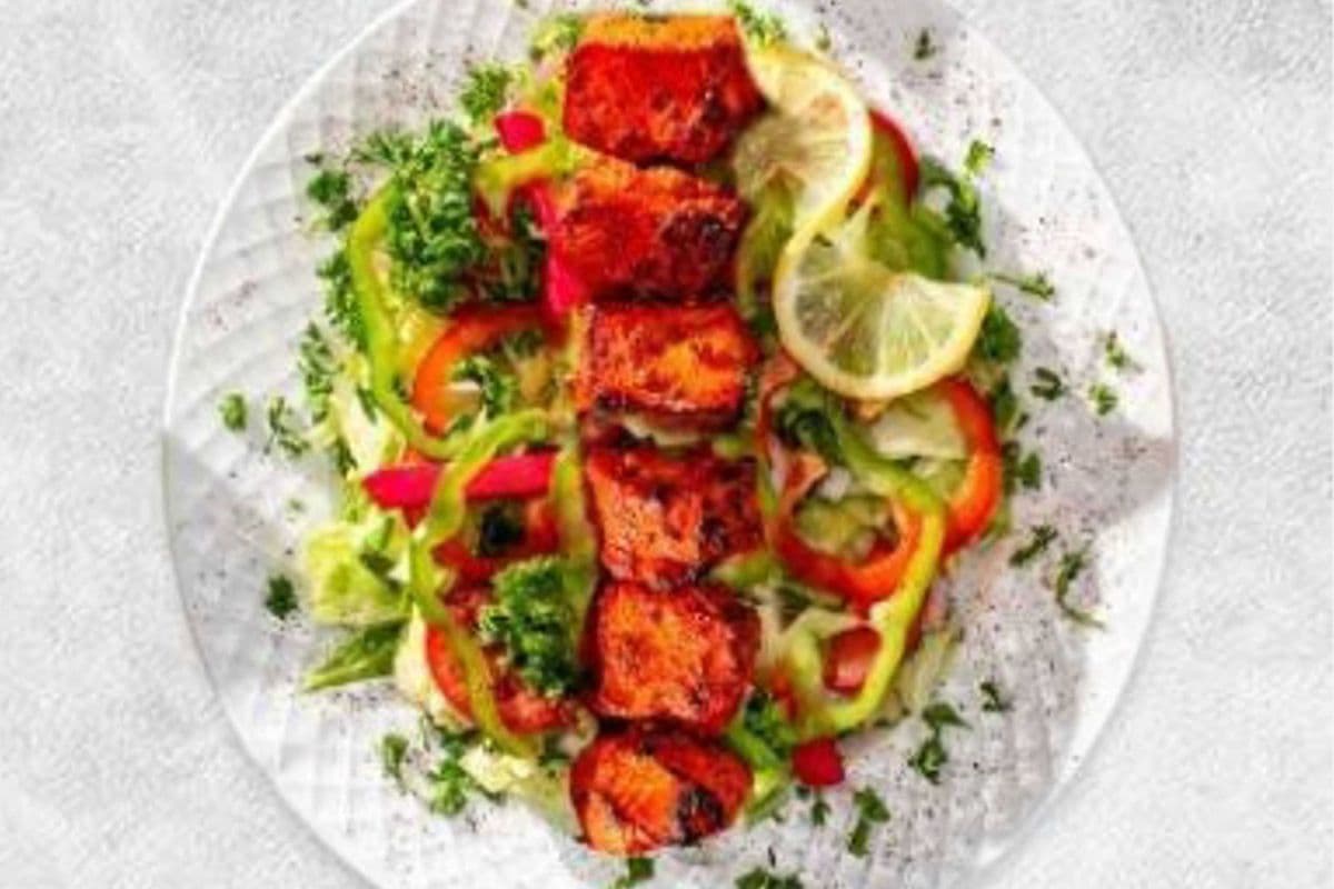 Spicy Chicken Tikka Over Salad