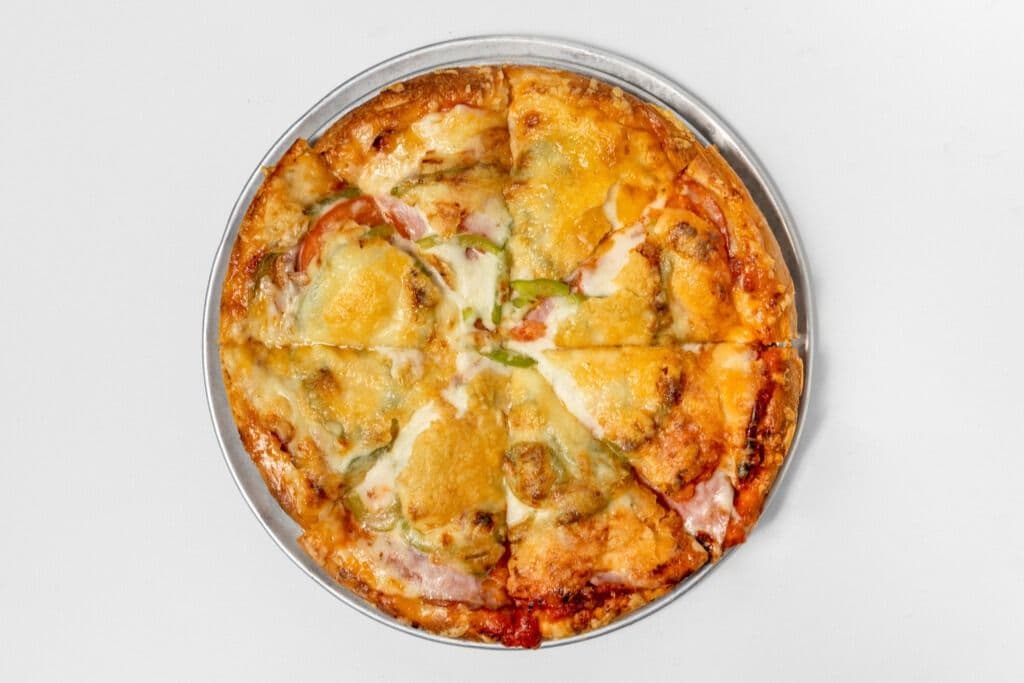 21. Large Back Bacon, Pepperoni, Green Pepper, and Tomato Pizza