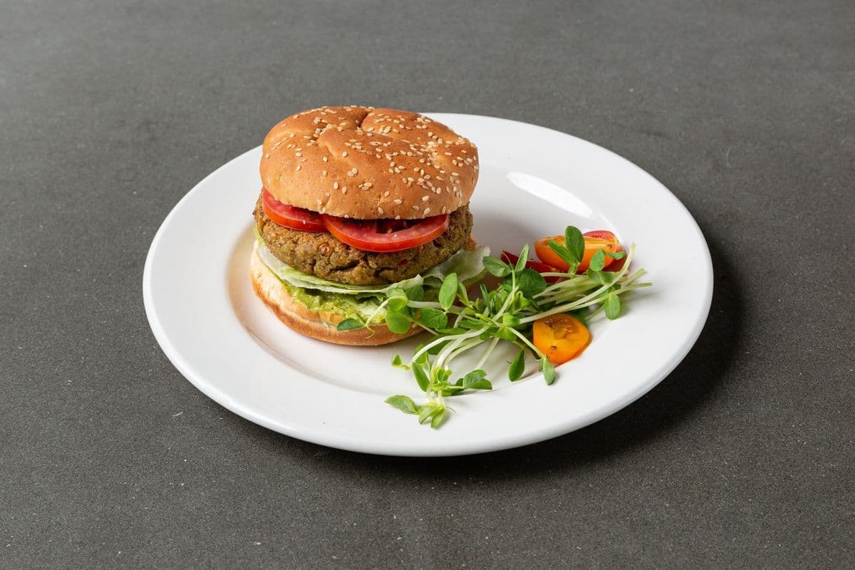 Chef's Housemade Veggie Burger with Tomato, Lettuce, and Guacamole (Vegan)