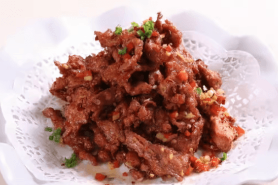 Sauteed Sliced Lamb with Cumin 葱爆羊肉