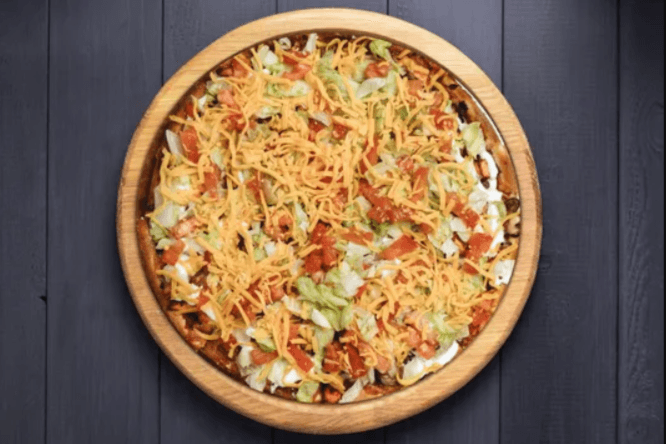 12. Single Medium Taco Special Pizza