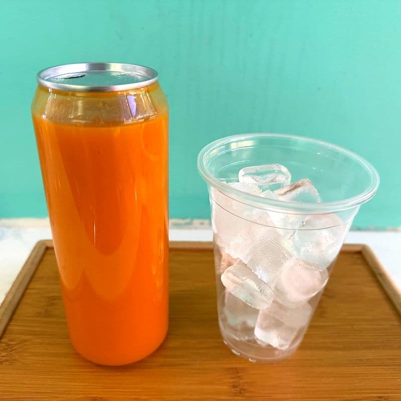 Fresh Daily Hand Pressed Mango Juice + Ice cup