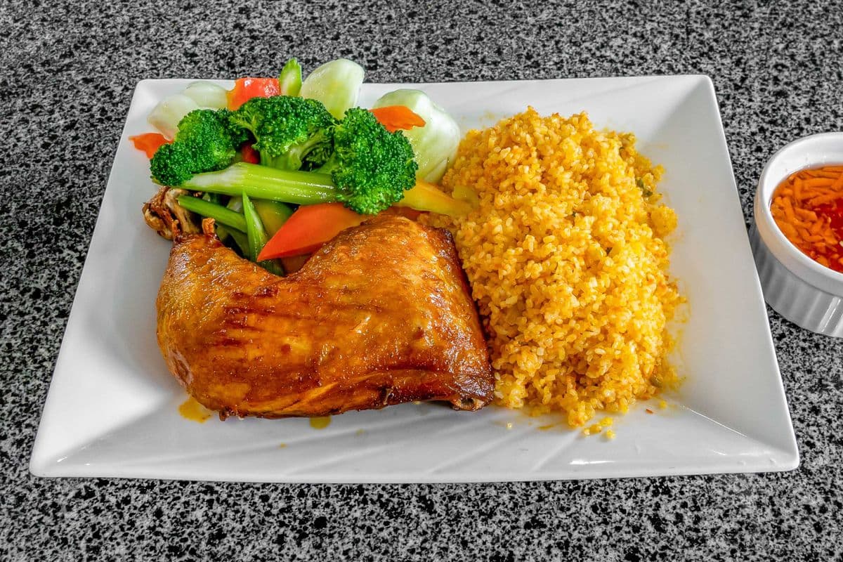 35B. Deep fried chicken leg with steamed veggies and fried rice