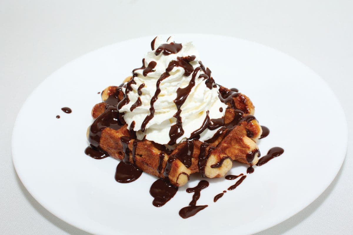 Liege Waffle with Whipped Cream and Chocolate Sauce