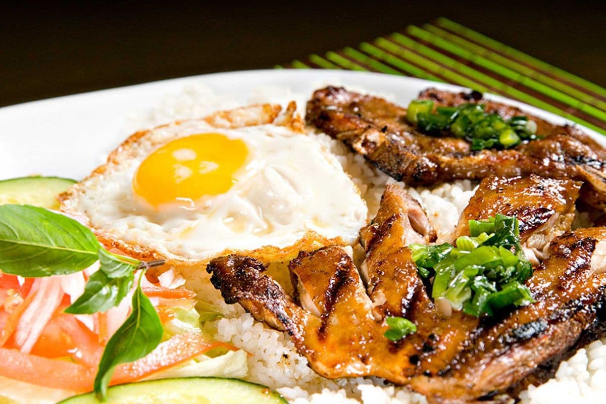 61. Grilled Lemongrass Pork Chop and Chicken with a Fried Egg on Broken Rice
