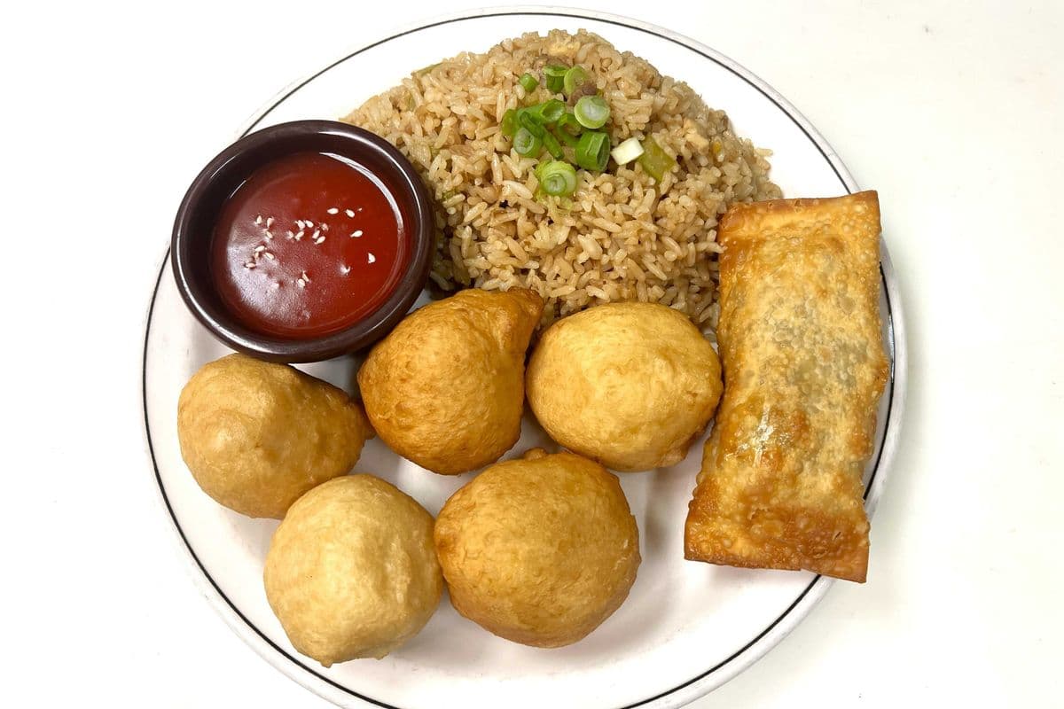 Sweet And Sour Chicken Ball Daily with chicken fried rice and egg roll . No substitution