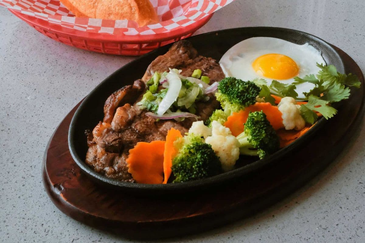 46. Beef Steak, Sunny-Side Up Egg, and Vegetables with Your Choice of Baguette or Rice