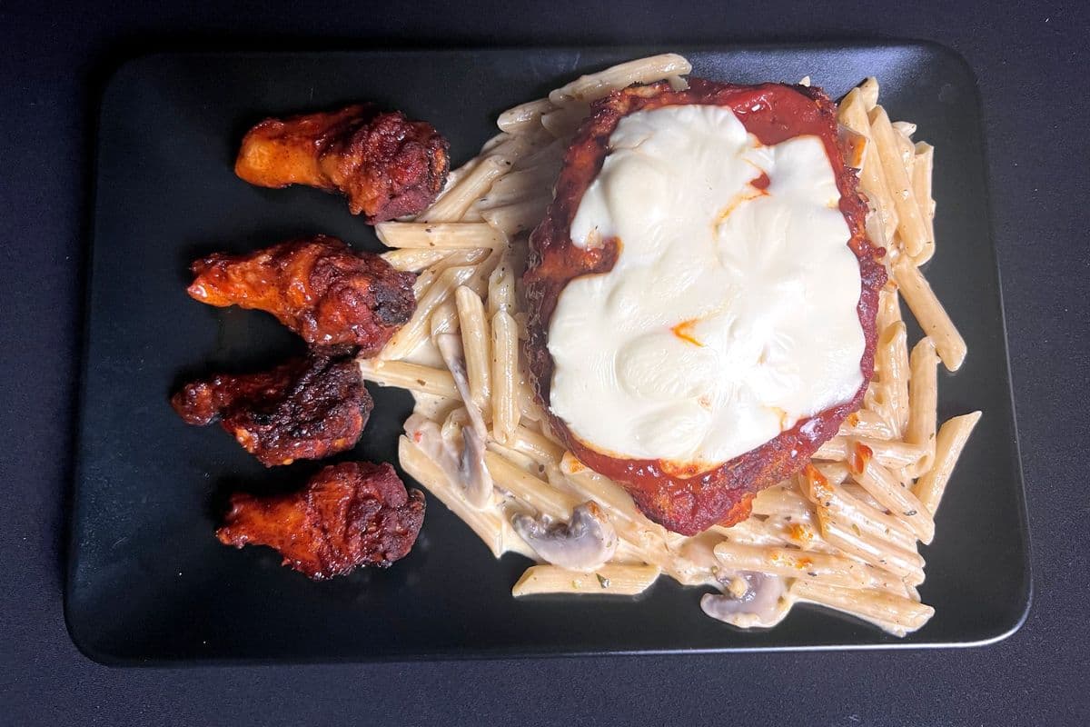 Chicken Parm Penne with wings and Alfredo sauce
