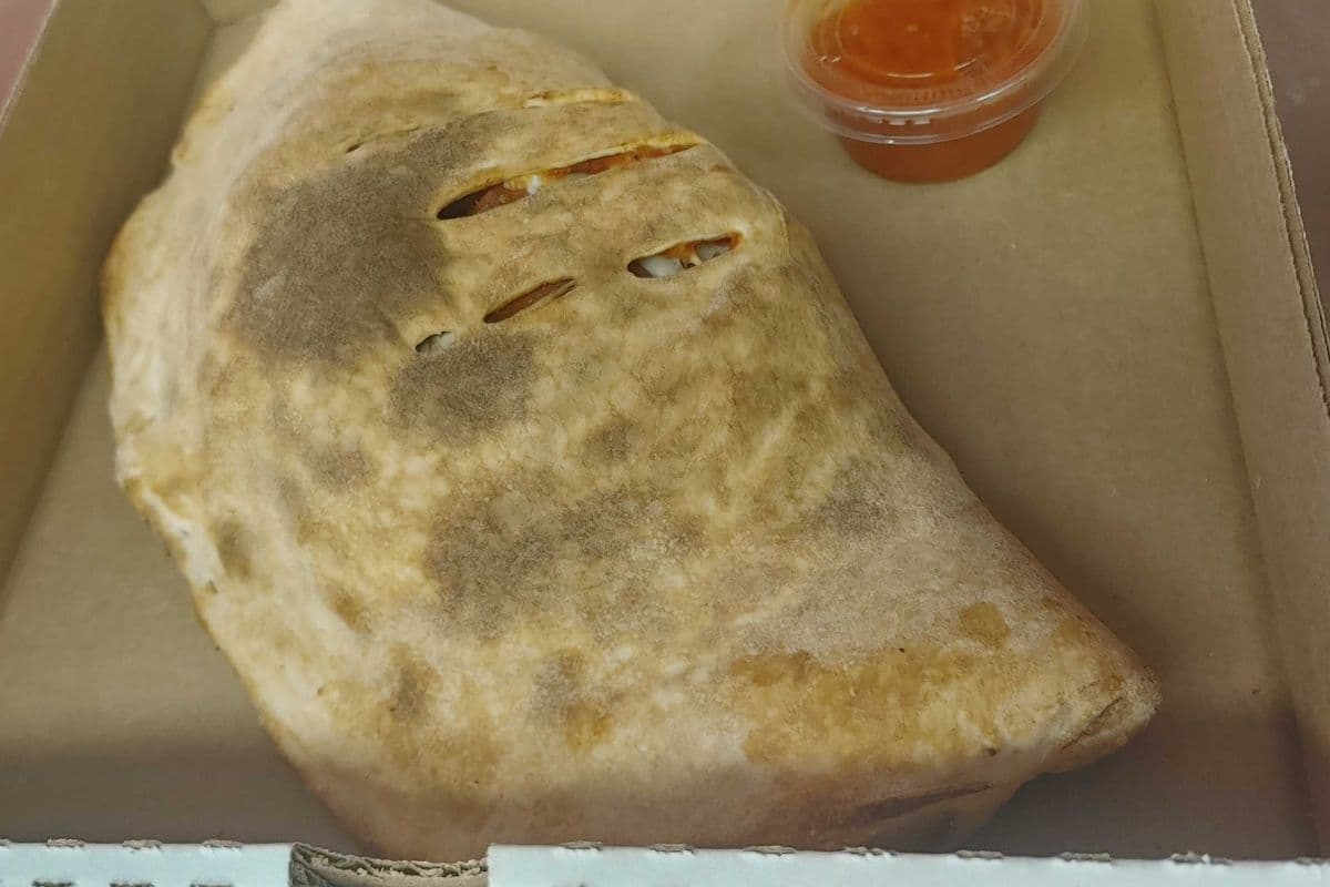 One Baked Panzerotti 12 Inch with Three Toppings and Marinara Sauce