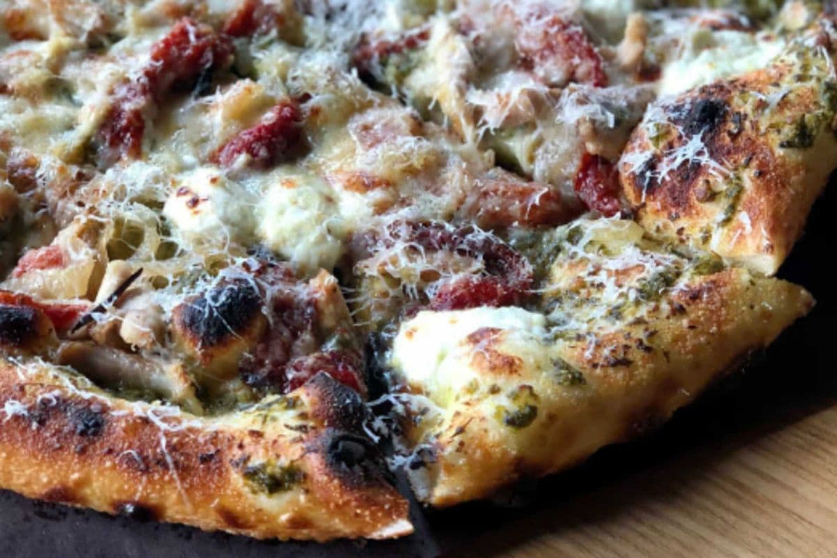 Kartik's Delight: Chicken, Almond Pesto, Goat Cheese, Red Pepper, Onions