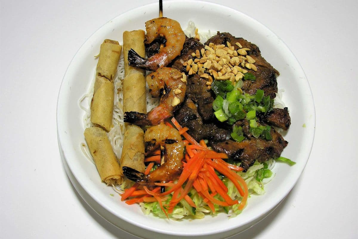 22. Vermicelli with Grilled Shrimp, Charbroiled Chicken, and Spring Rolls "Replace Rice or Vegetables Add $1.00"