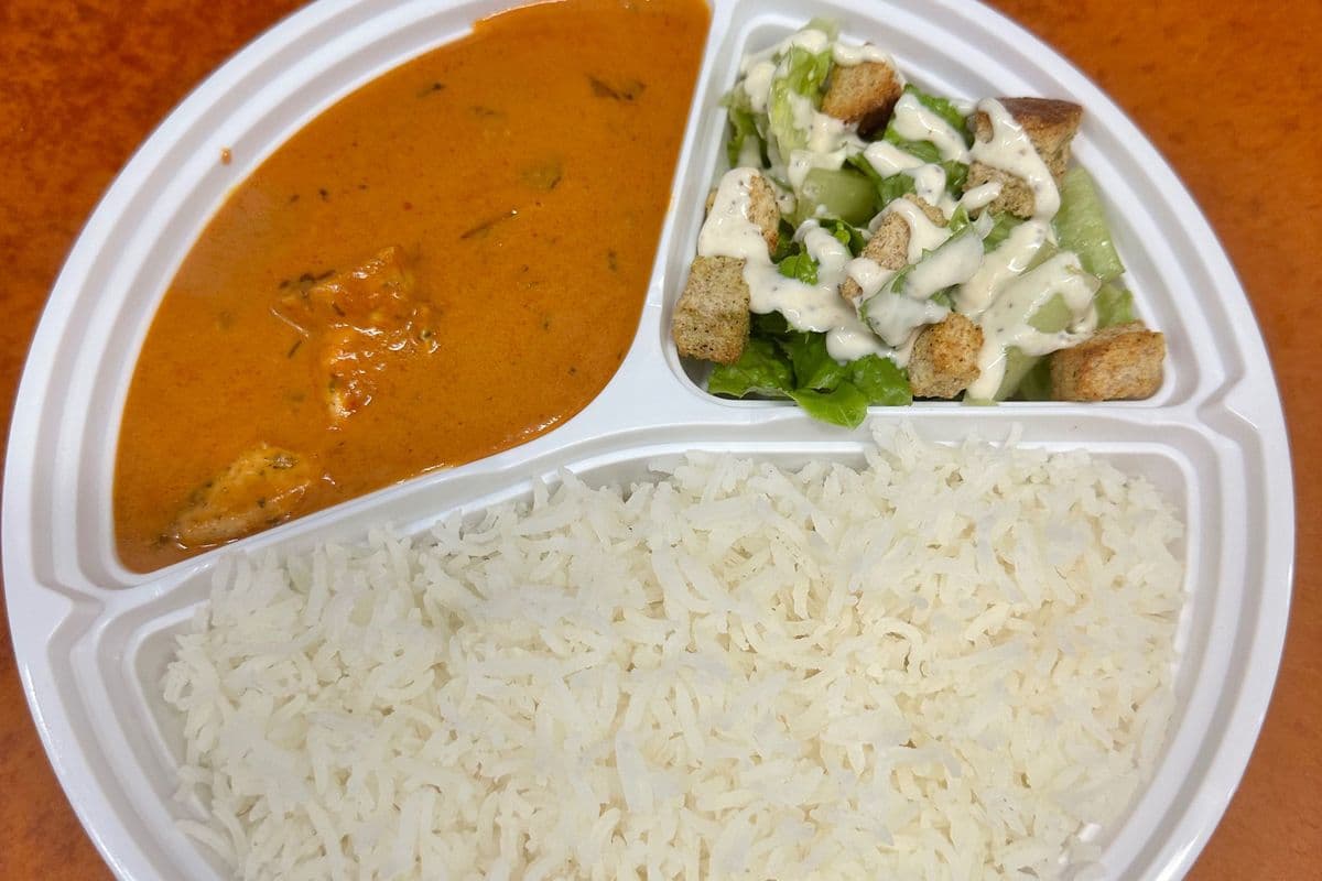 Personal Butter Chicken or Paneer, Rice, Naan, and Caesar Salad