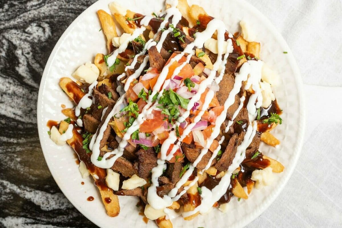 Mixed Chicken Shawarma and Donair Poutine(Large)