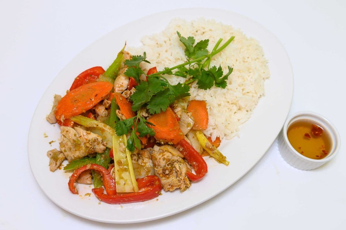 75. Spicy Stir-Fried Lemongrass Chicken and Vegetables on Steamed Rice