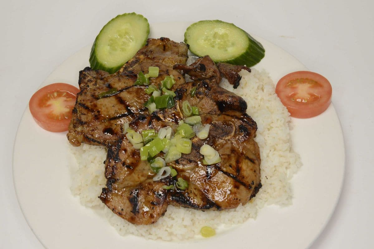55-Grilled Pork Chop on Steamed Rice (cơm thịt nướng)