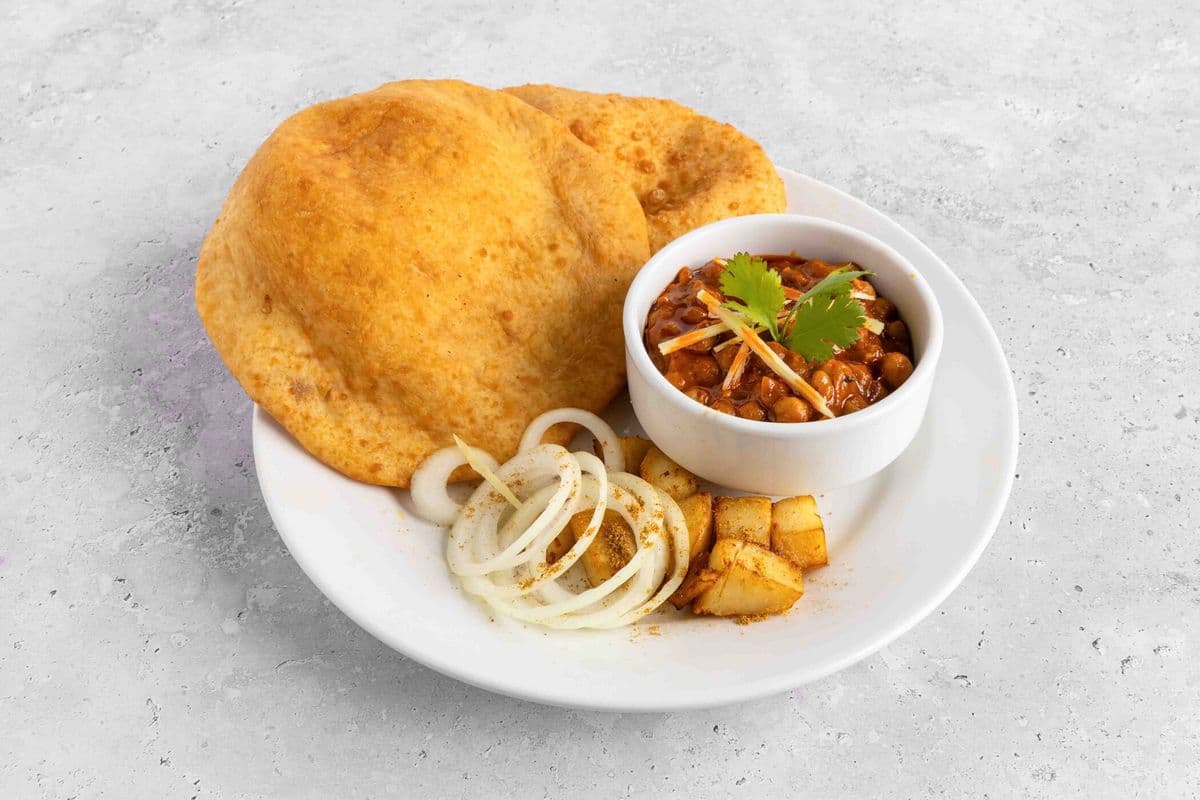 Choley Bhature (With Aloo, pickle and onion)