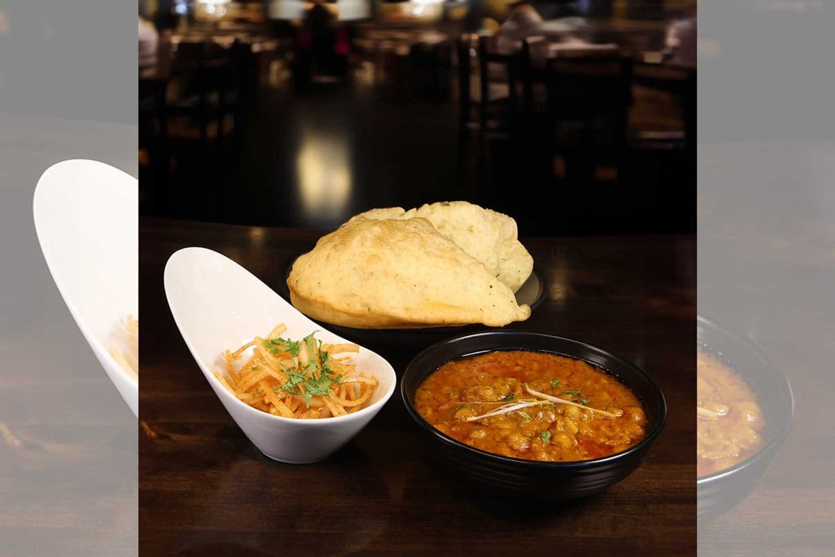 Channa with Bhattura, Onion Pickle and Pop