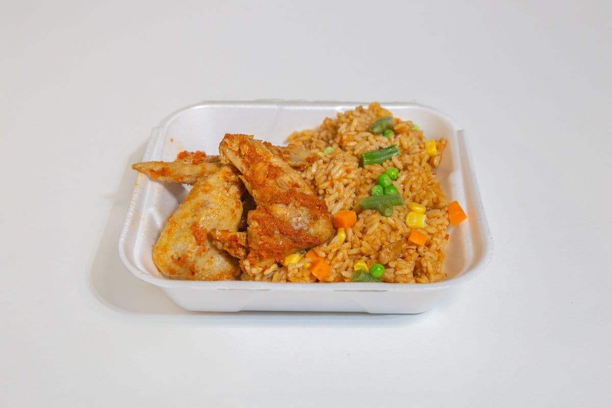 Jollof Rice With Peppered Chicken Wings