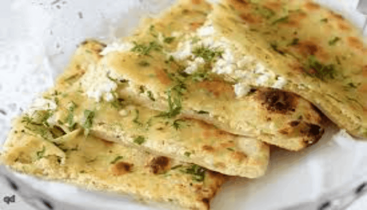 Paneer Kulcha served with a side of channa masala