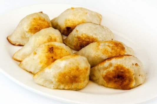 Dumplings Poëlés au Porc (4 pcs ) / Pan-Fried Pork Dumpings (4 pcs) 锅贴