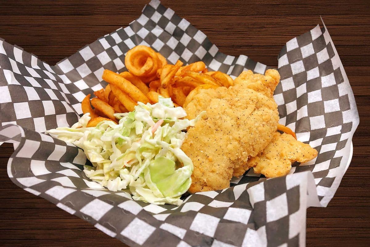 Four Pieces Chicken Strips and Curly Fries with Tangy Coleslaw