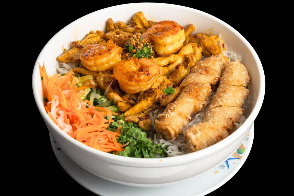 B28. Vermicelli with 2 Spring Rolls, 3 Grilled Shrimps, and Satay Chicken