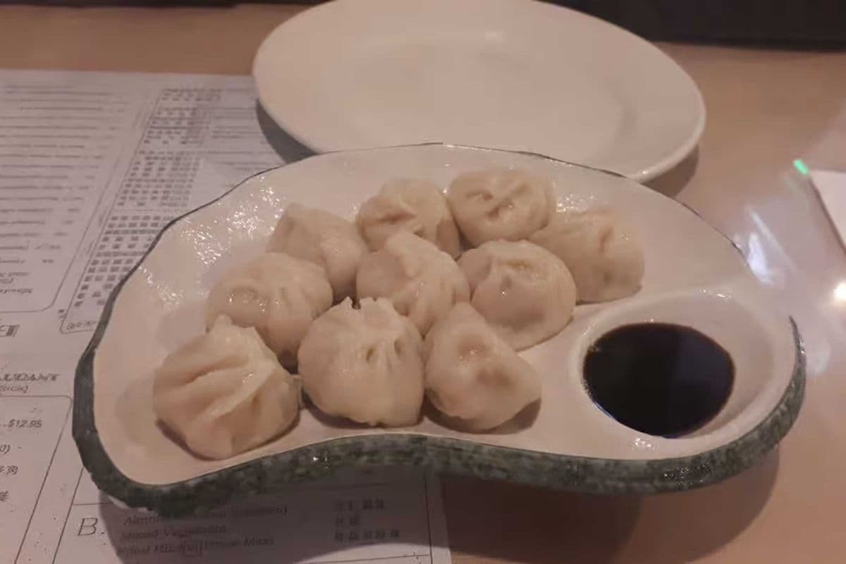 5. Steamed Shanghai-Style Dumplings (10 pcs)