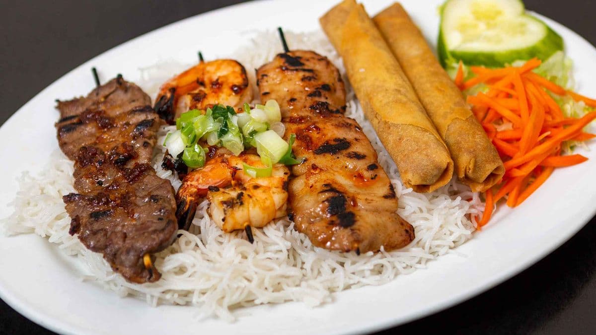 47.Grilled Satay Beef, Chicken, Shrimp Skewers & Spring Rolls on Rice Vermicelli