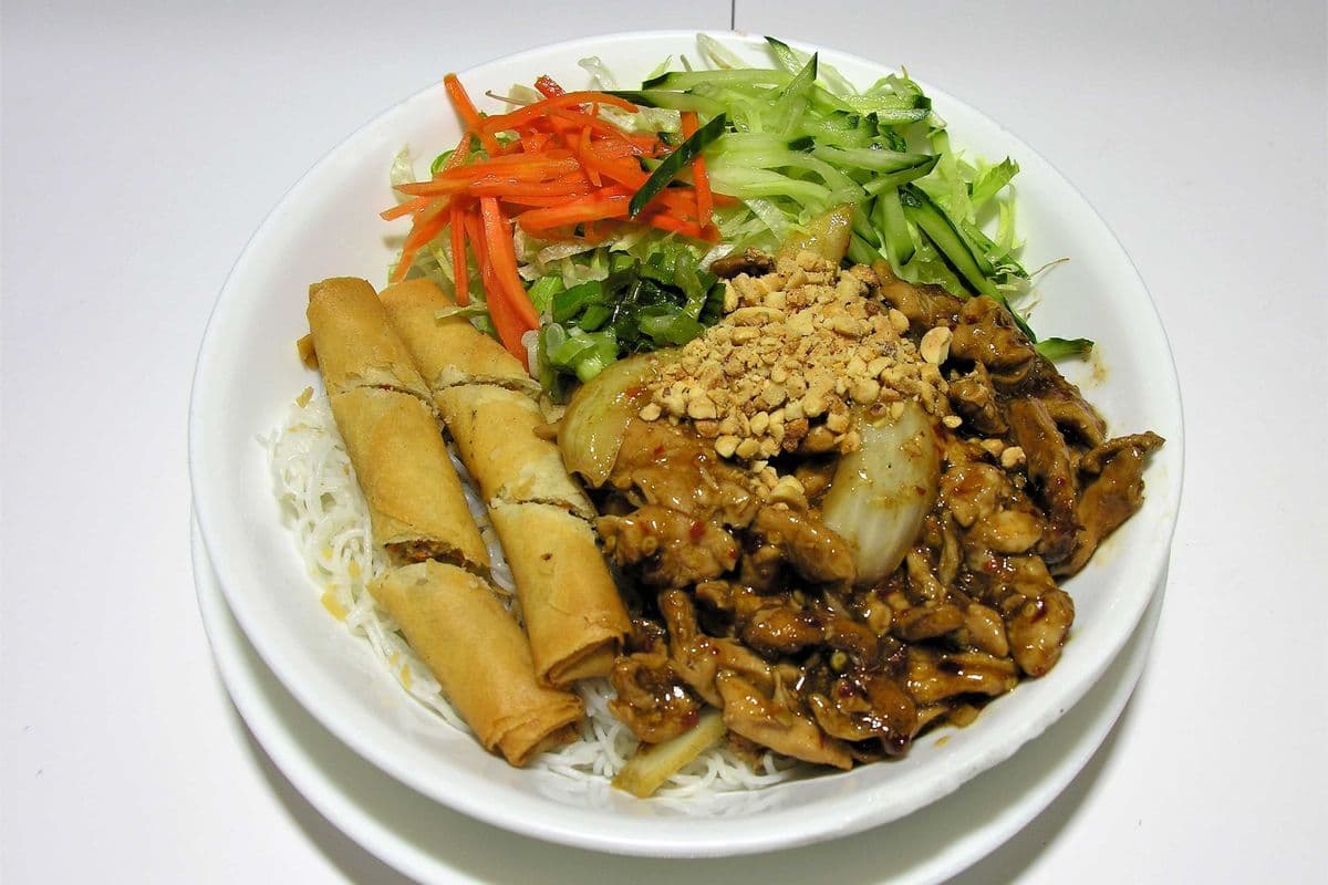 18. Vermicelli with Satay Chicken and Spring Rolls "Replace Rice or Vegetables Add $1.00"