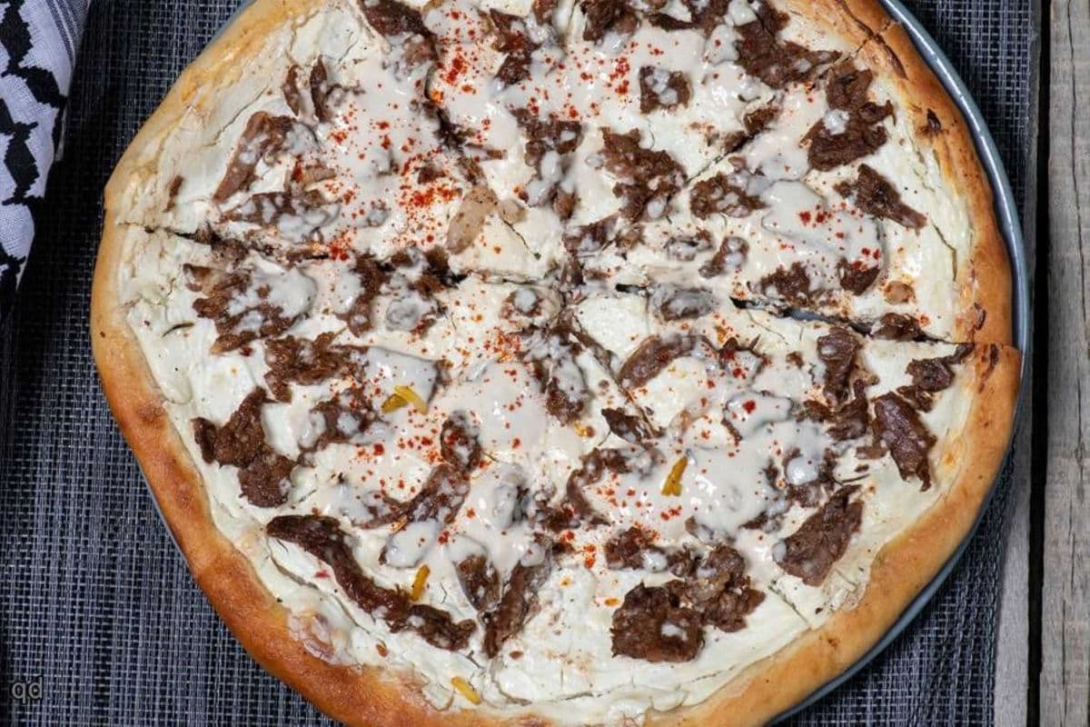 Buy one Get Small Four Topping Chicken Shawarma Pizza