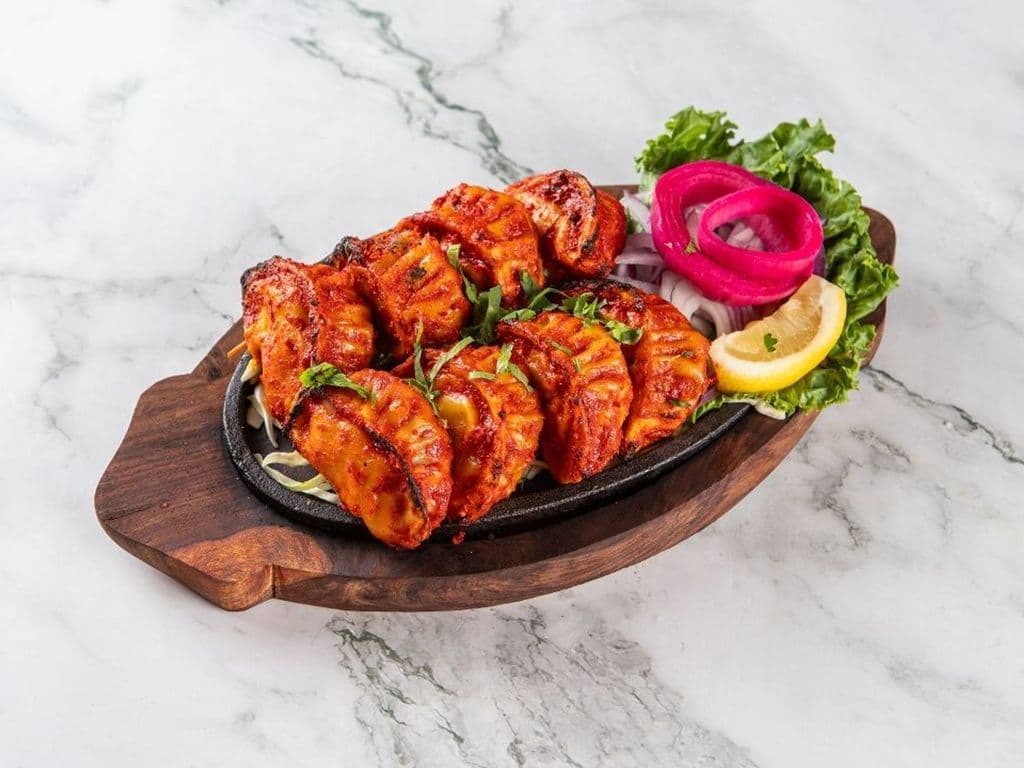 CHICKEN TANDOORI MOMOS