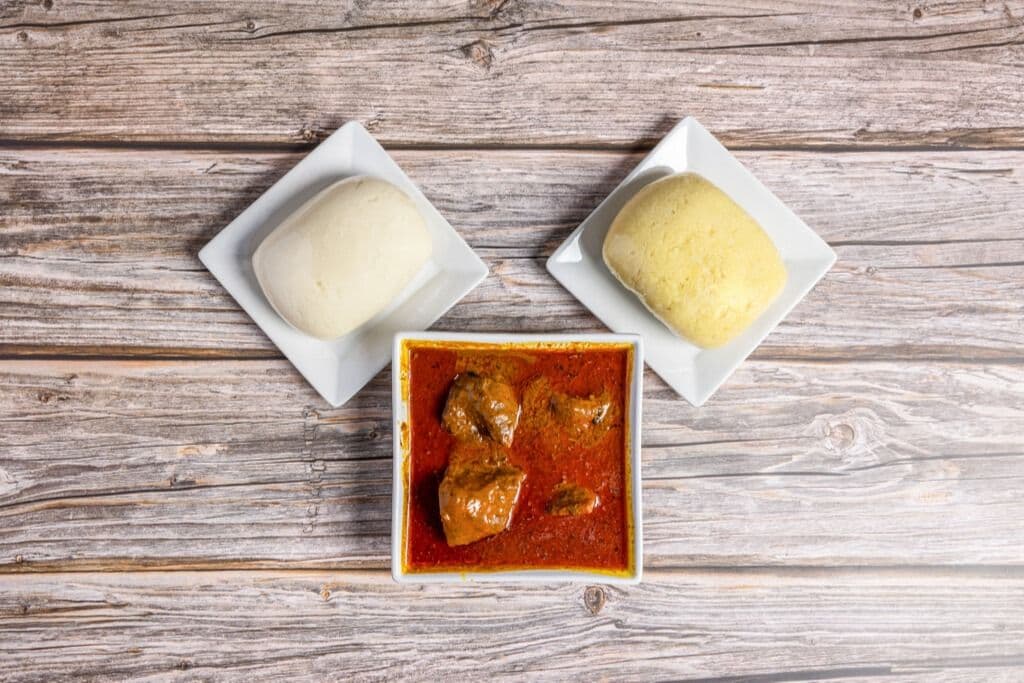 Banga Soup (Tilapia Fish) and Poundo Yam with Yellow Garri
