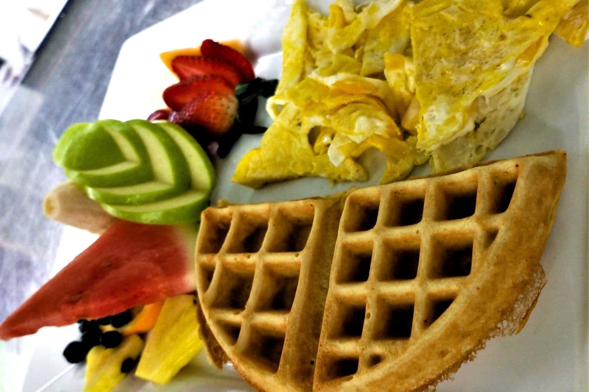 Half Waffle, Fresh Fruit Bowl & Eggs