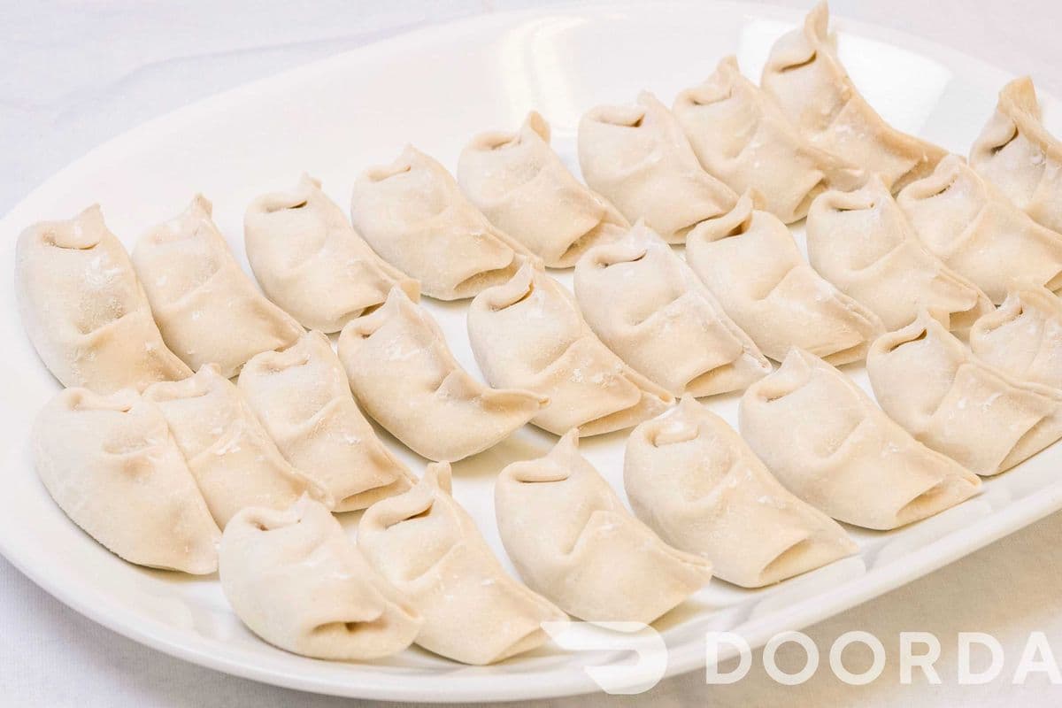 E2. Corn with Cabbage and Pork Dumplings 粟米高麗菜豬肉 (25 pcs) Reg (25pcs)