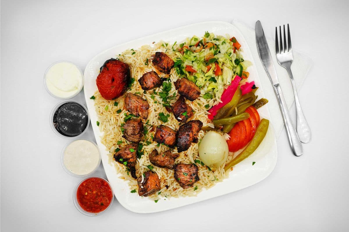 Lamb Tikka rice and salad meal