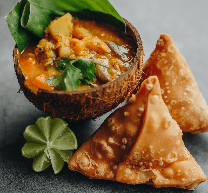 Vegetarian Sambar Soup with Vegetable Samosa