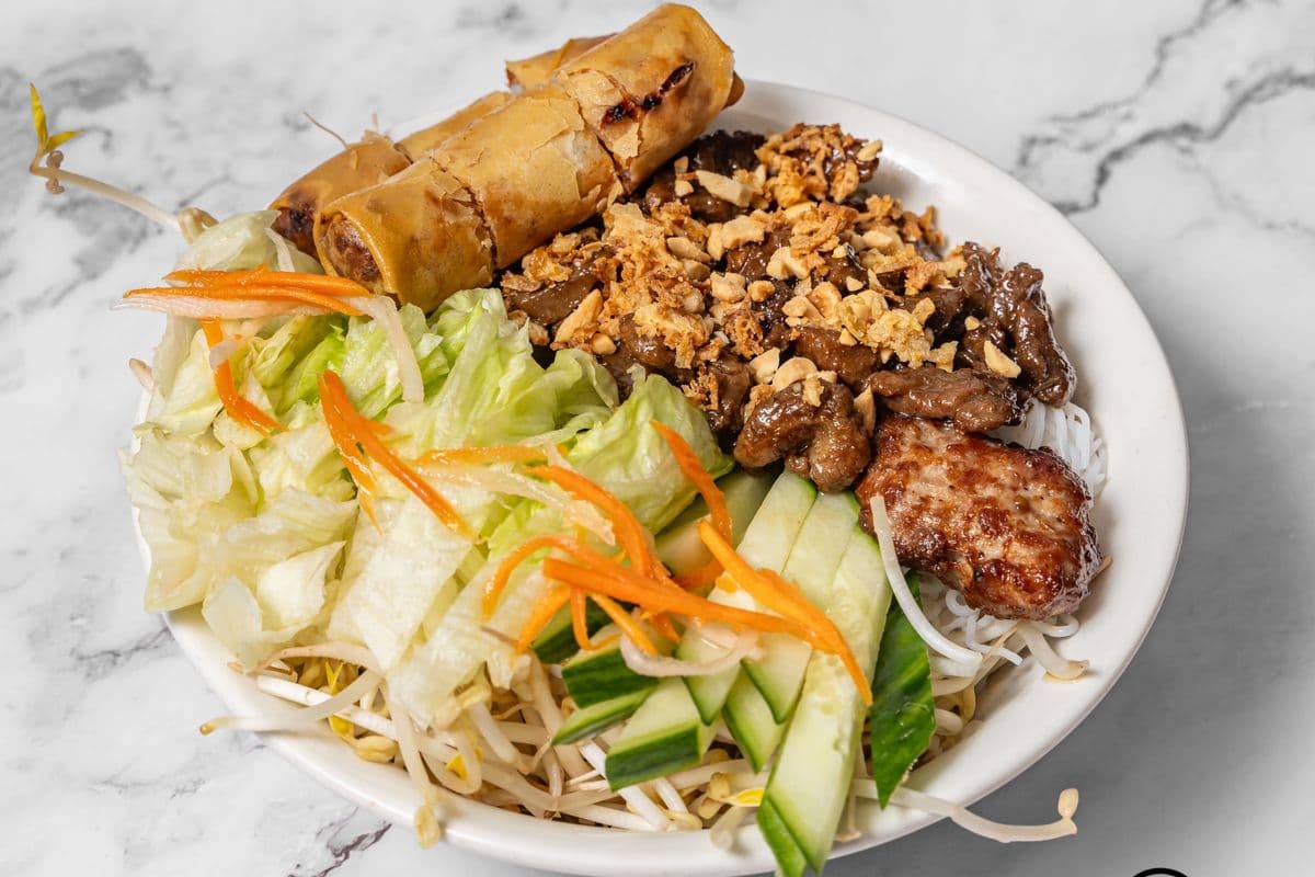 84. Vermicelli Bowl with Grilled Pork and Spring Rolls