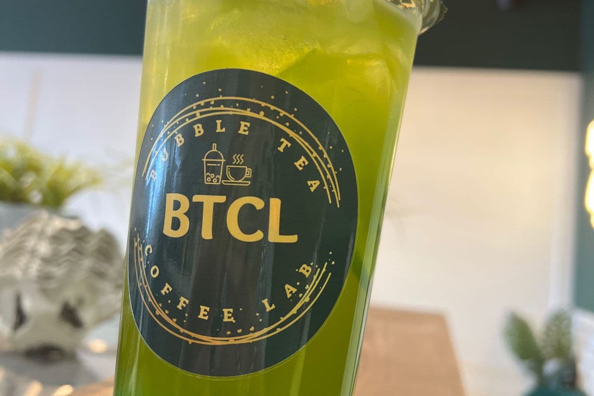 Green Apple Ice Shaken Green Tea a with black boba