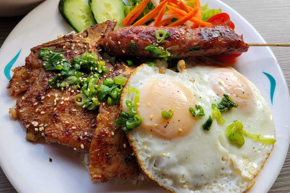 68. GRILLED PORK-CHOP, & FRIED EGGS