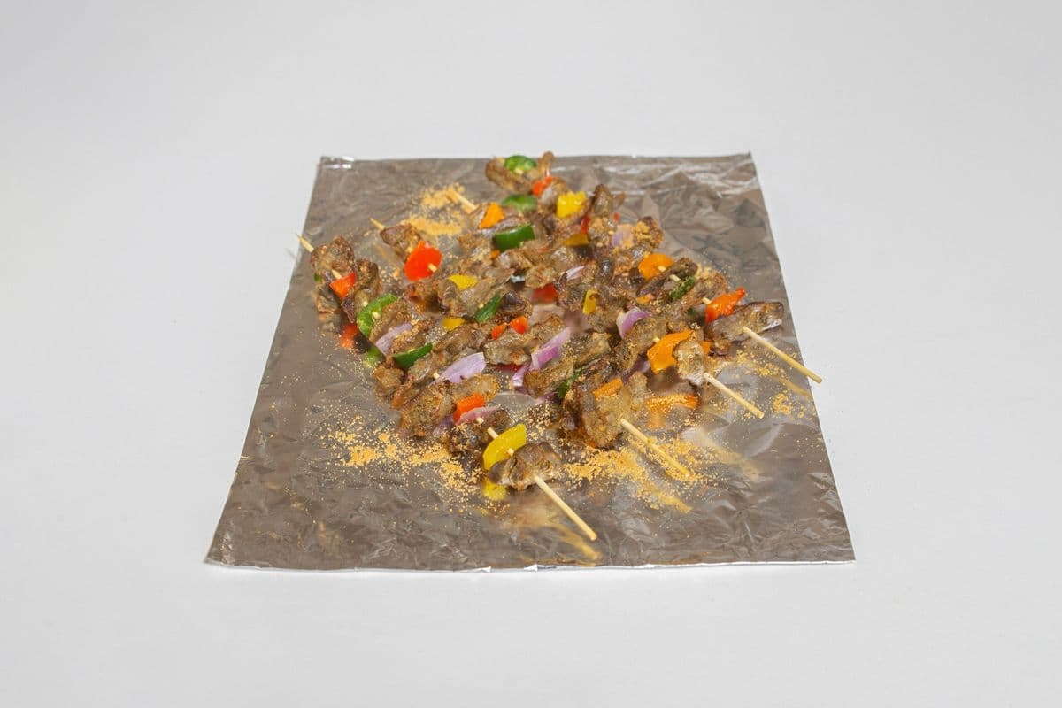 Gizzard Skewer Drizzled With Suya Pepper