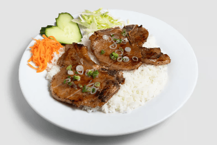 49. Charbroiled Pork Chops on Steamed Rice (2 pcs)