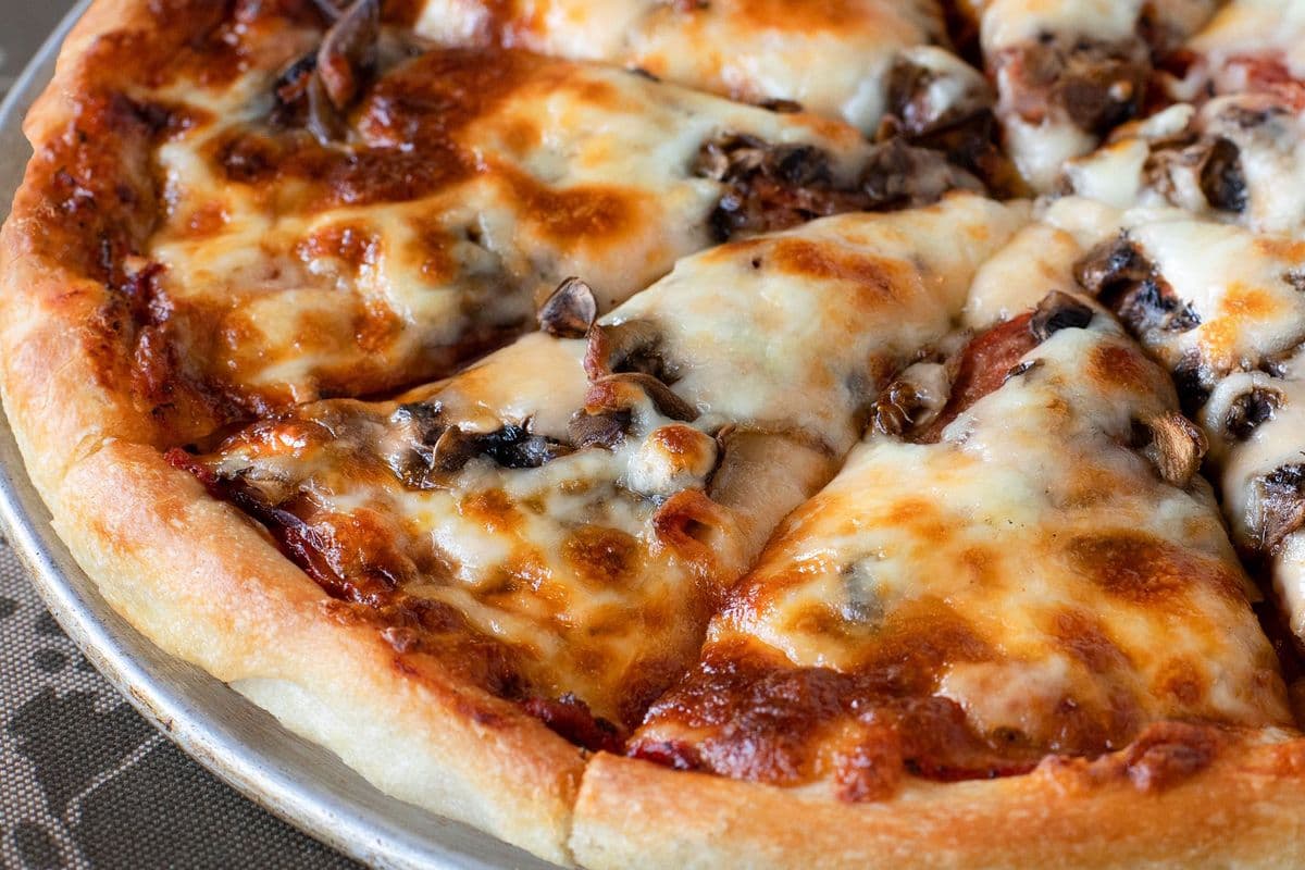 #11 Pepperoni, Canadian Bacon, and Mushroom Pizza