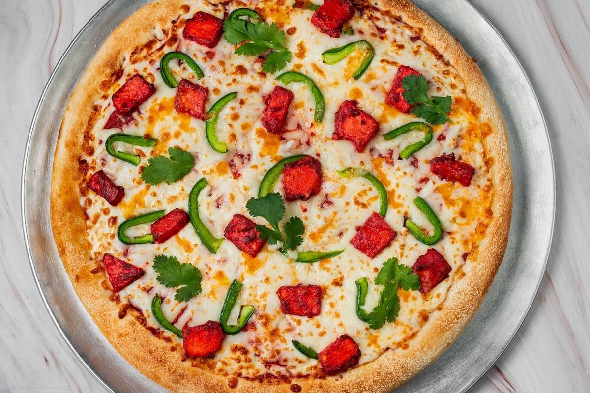 Any Medium Pizza with Pop and Curly Fries